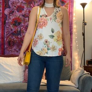 Cut out floral, sleeveless blouse